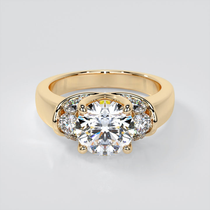 Round Cut Trellis Style Tapered Engagement Ring