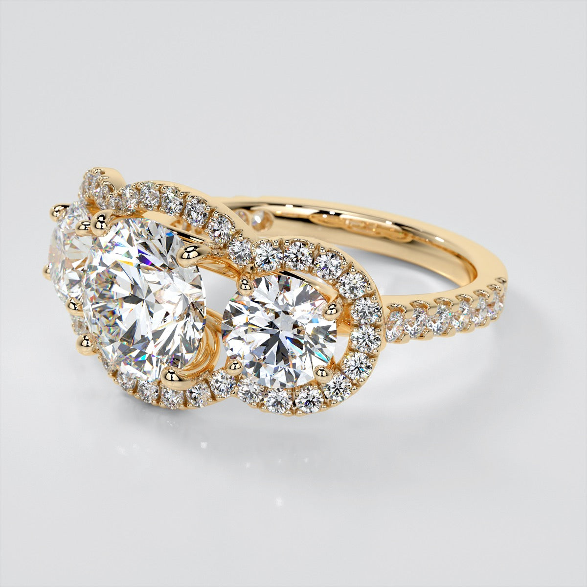 Round Cut Three-Stone Trellis Engagement Ring with Accents