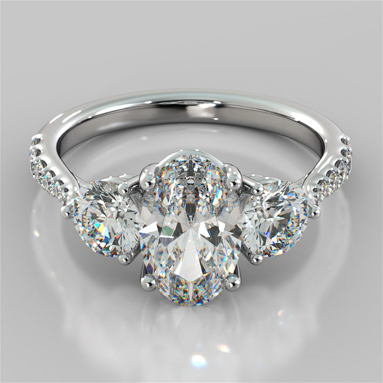 Oval Cut Three-Stone Wedding Set With Accents