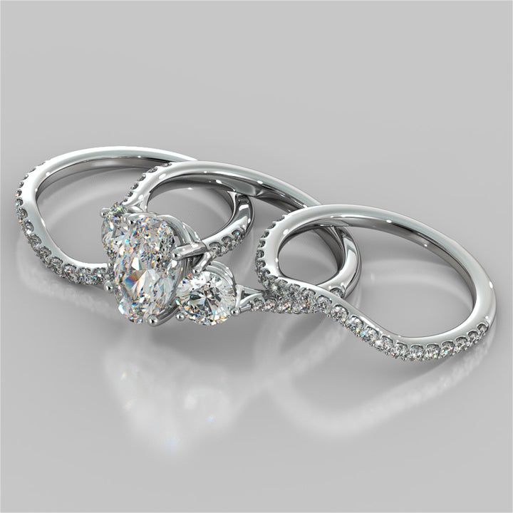 Oval Cut Three-Stone Engagement Ring With Accents