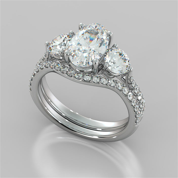 Oval Cut Three-Stone Engagement Ring With Accents