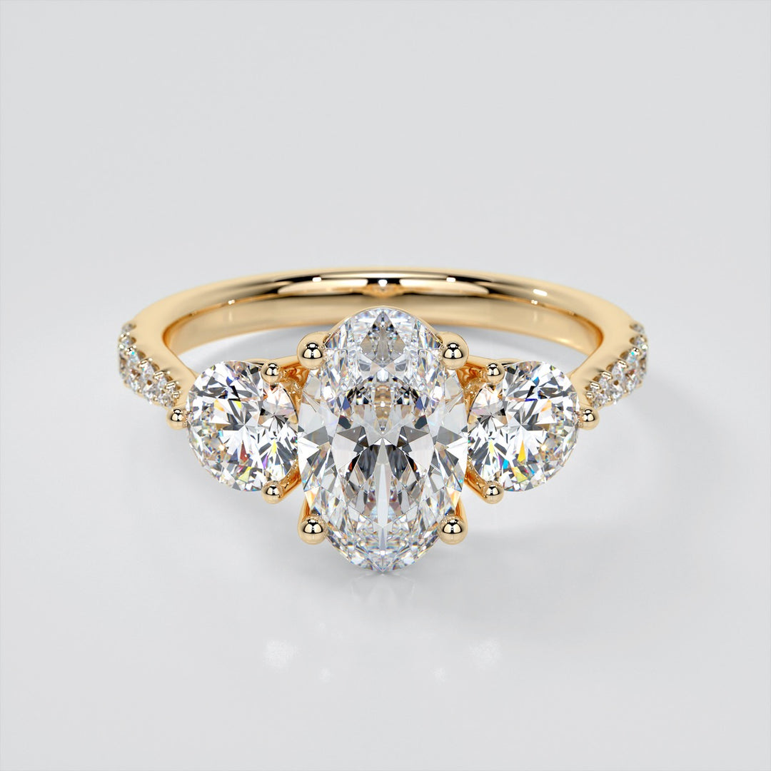 Oval Cut Three-Stone Engagement Ring With Accents