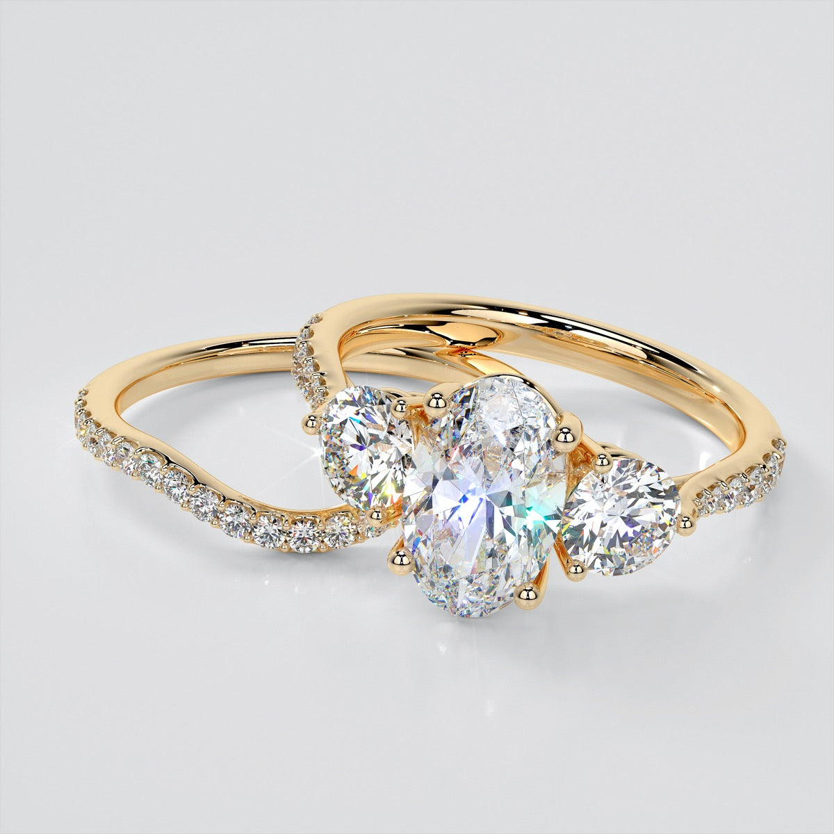 Oval Cut Three-Stone Wedding Set With Accents