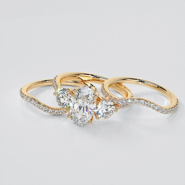 Oval Cut Three-Stone Engagement Ring With Accents