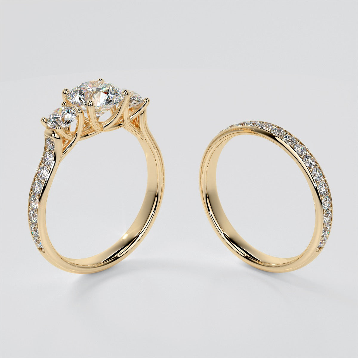 Round Cut Three Stone Trellis Wedding Set With 2 Matching Bands