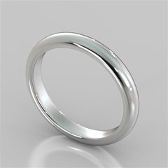 Silver ring on a reflective gray surface