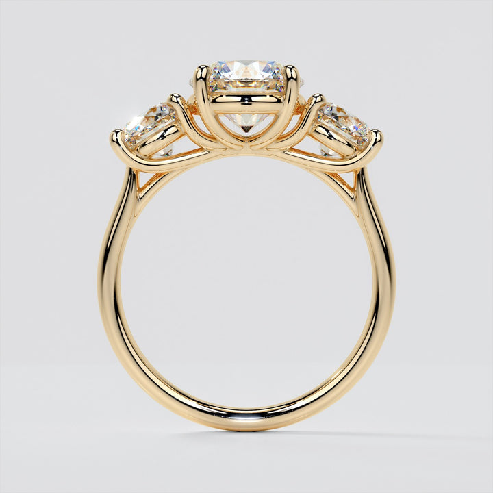 Round Cut Three-Stone Engagement Ring With Accents