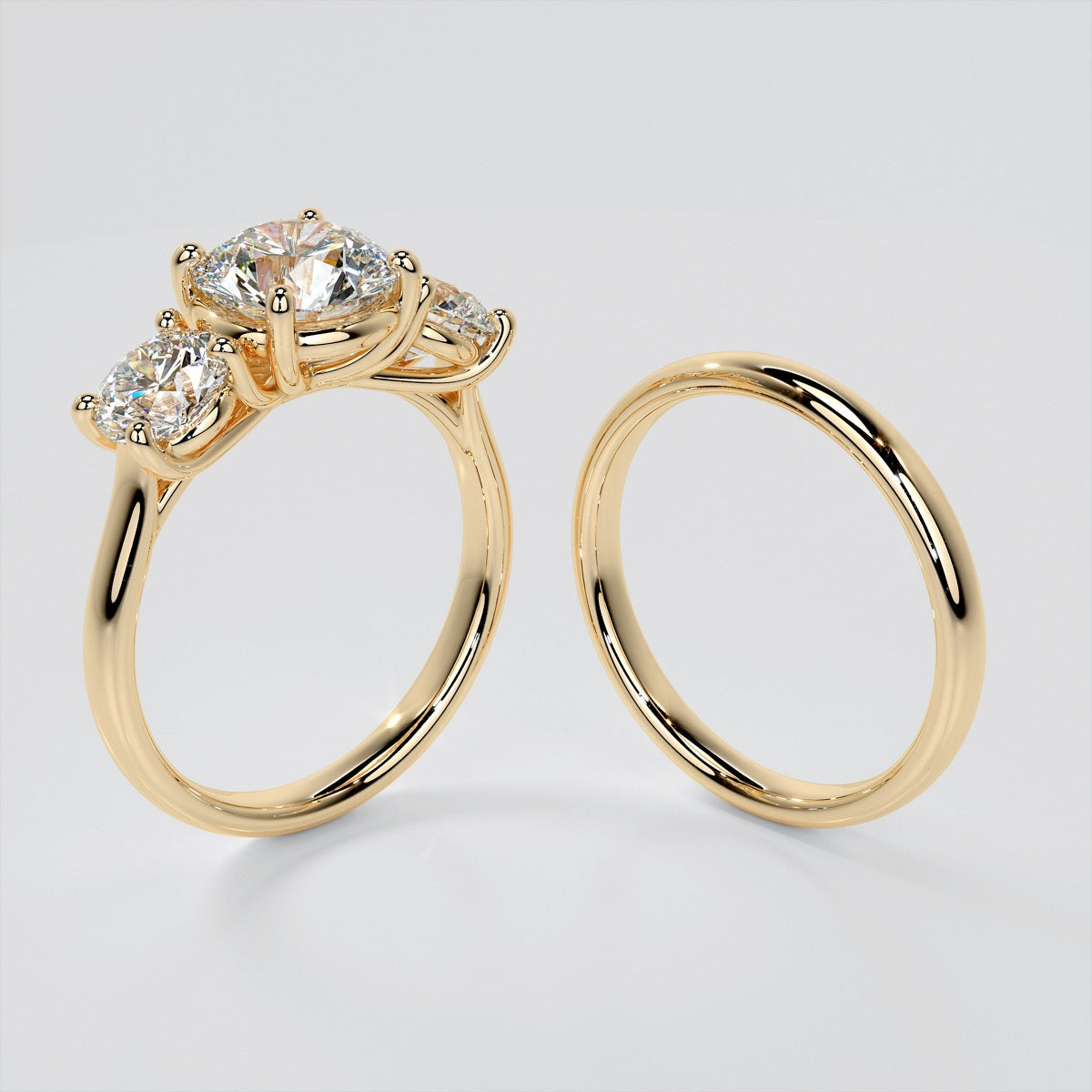 Round Cut Three-Stone Wedding Set With 2 Matching Bands