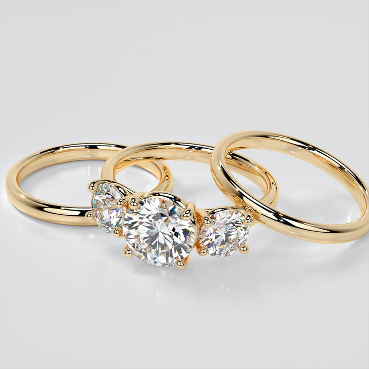Round Cut Three-Stone Engagement Ring With Accents