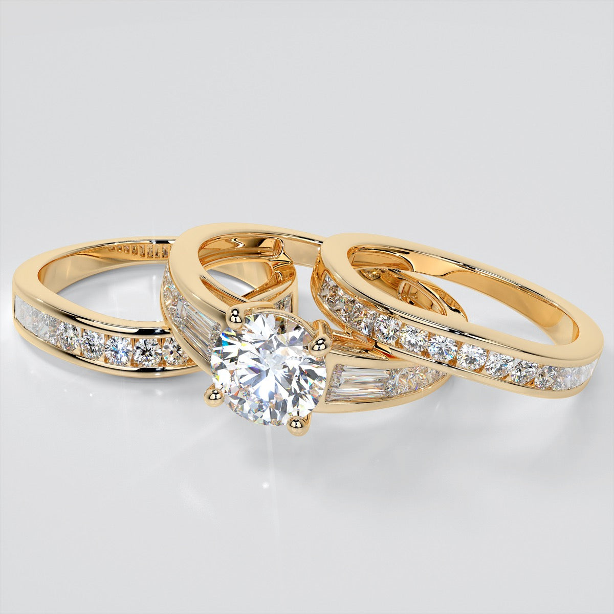 Round Cut Trio Wedding Set With Baguettes Accents