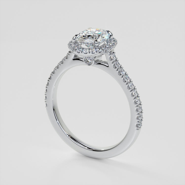 Oval Cut Halo Engagement Ring With Accents