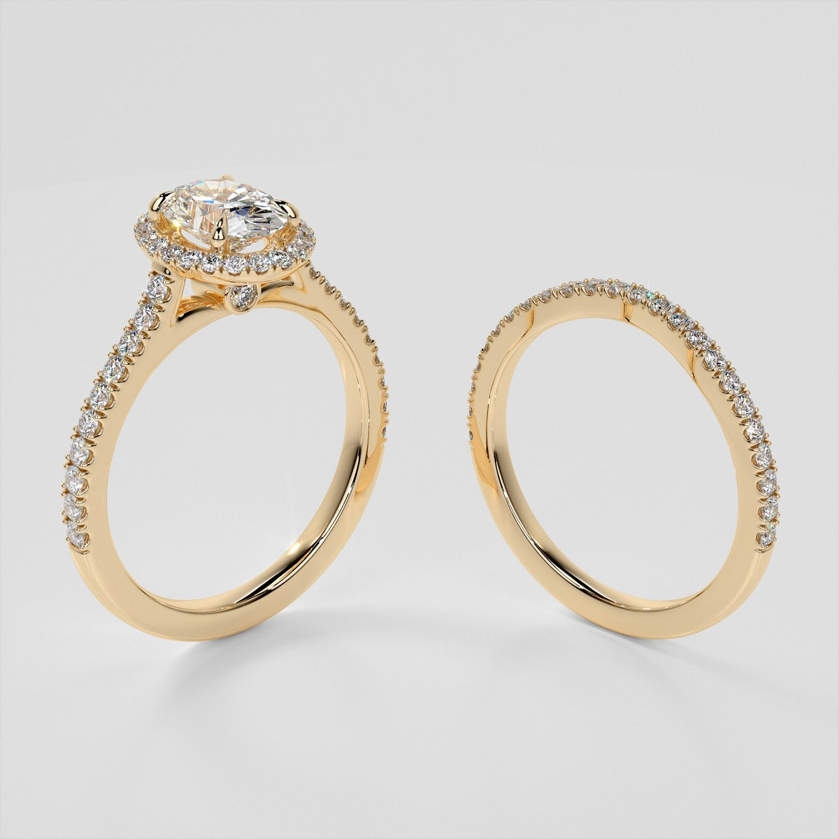 Oval Cut Halo Style Trio Wedding Set With Accents
