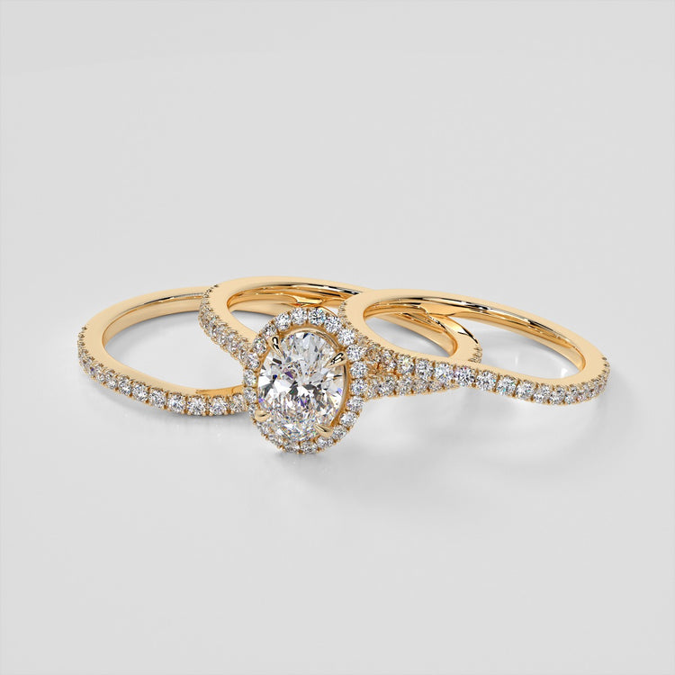 Oval Cut Halo Wedding Set With Accents