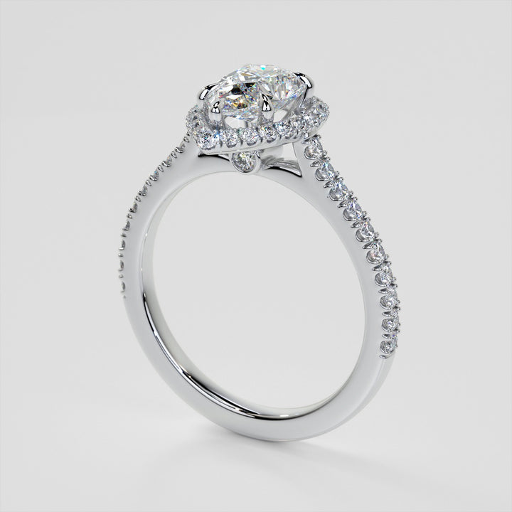 Pear Cut Halo Engagement Ring With Accents