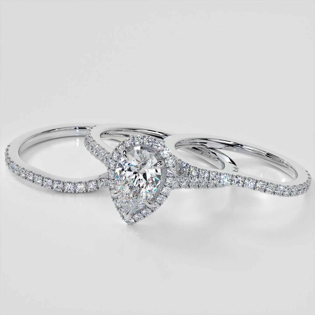 Pear Cut Halo Engagement Ring With Accents