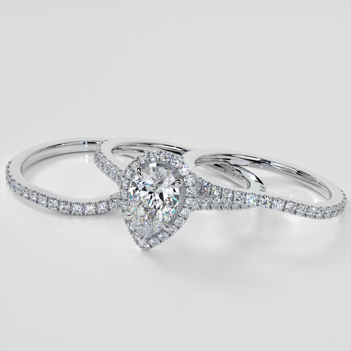 Pear Cut Halo Engagement Ring With Accents
