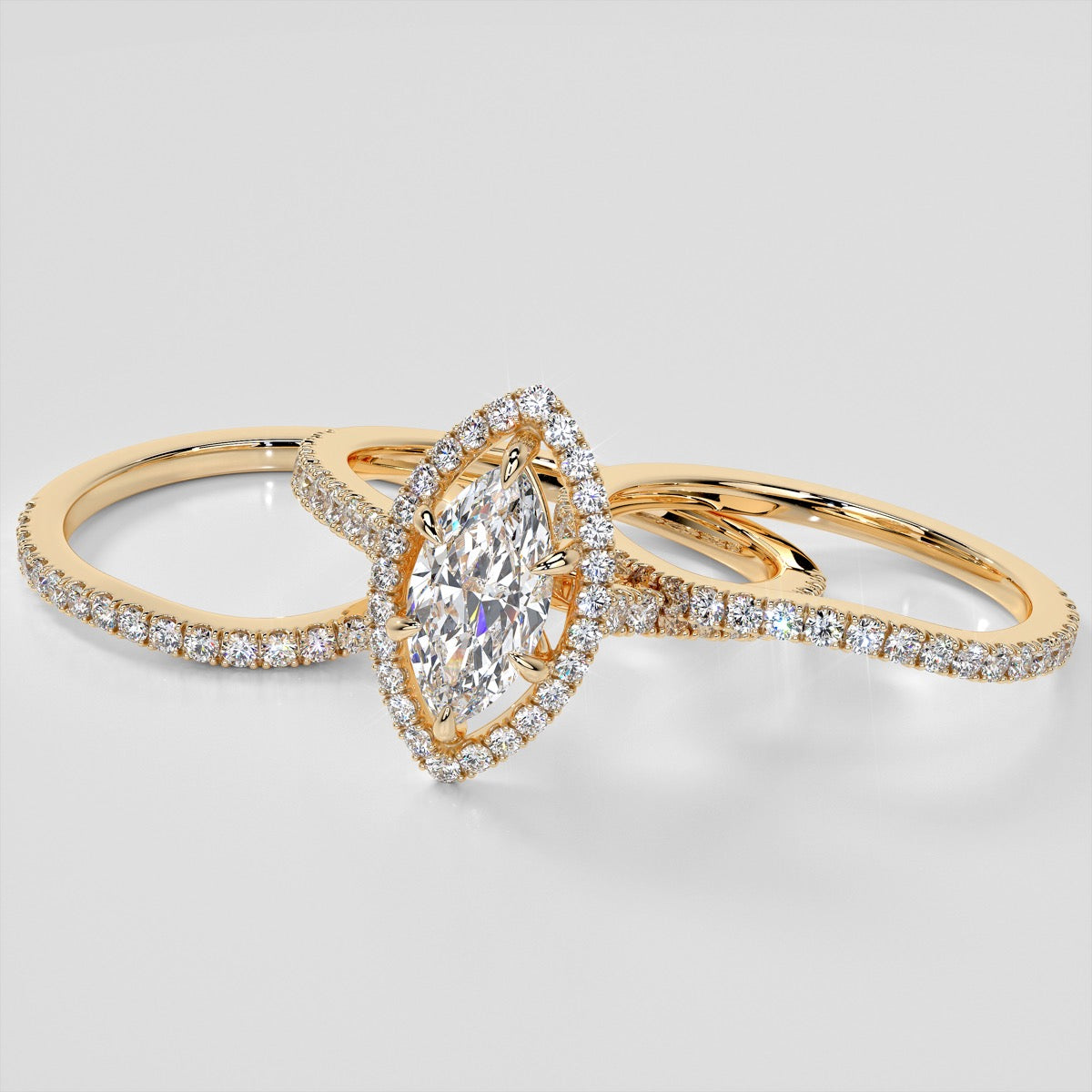 Marquise Cut Trio Wedding Set With Pavé Halo