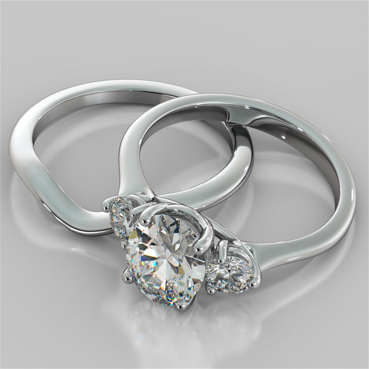 Oval Cut Three-Stone Trio Wedding Set