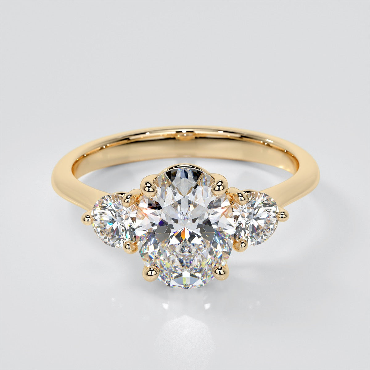 Oval Cut Three-Stone Trio Wedding Set