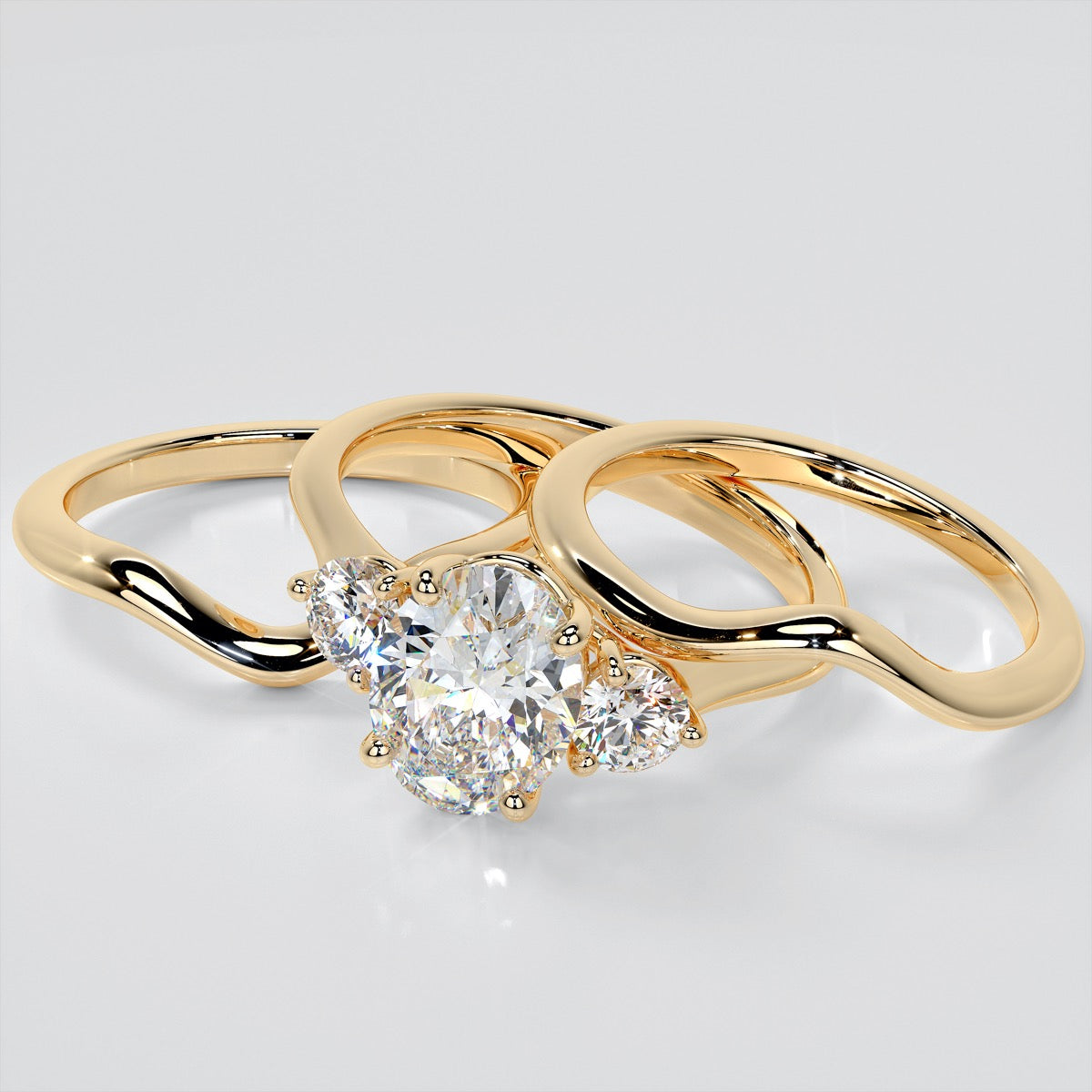 Oval Cut Three-Stone Wedding Set