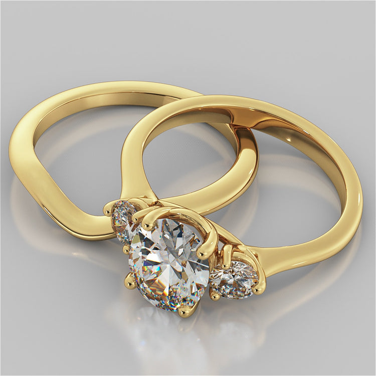 Oval Cut Three-Stone Wedding Set