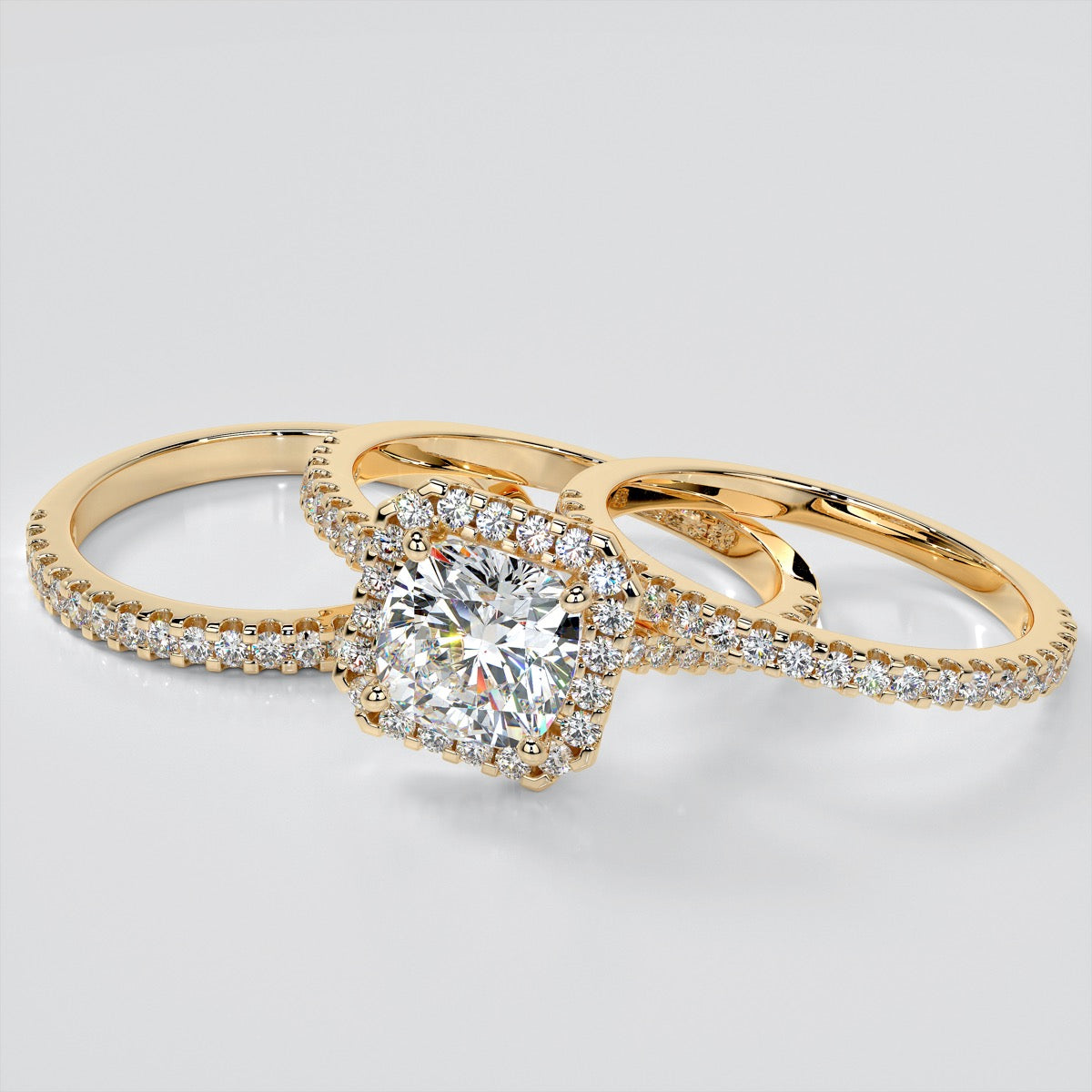 Cushion Cut Trio Wedding Set with Pavé-Style Halo