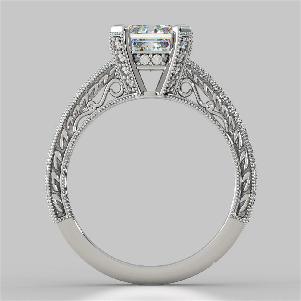 Filigree Style Princess Cut Trio Wedding Set with Round Accents