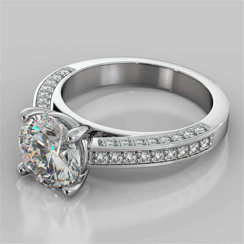 Round Cut Cathedral Engagement Ring with Channel Set Accents