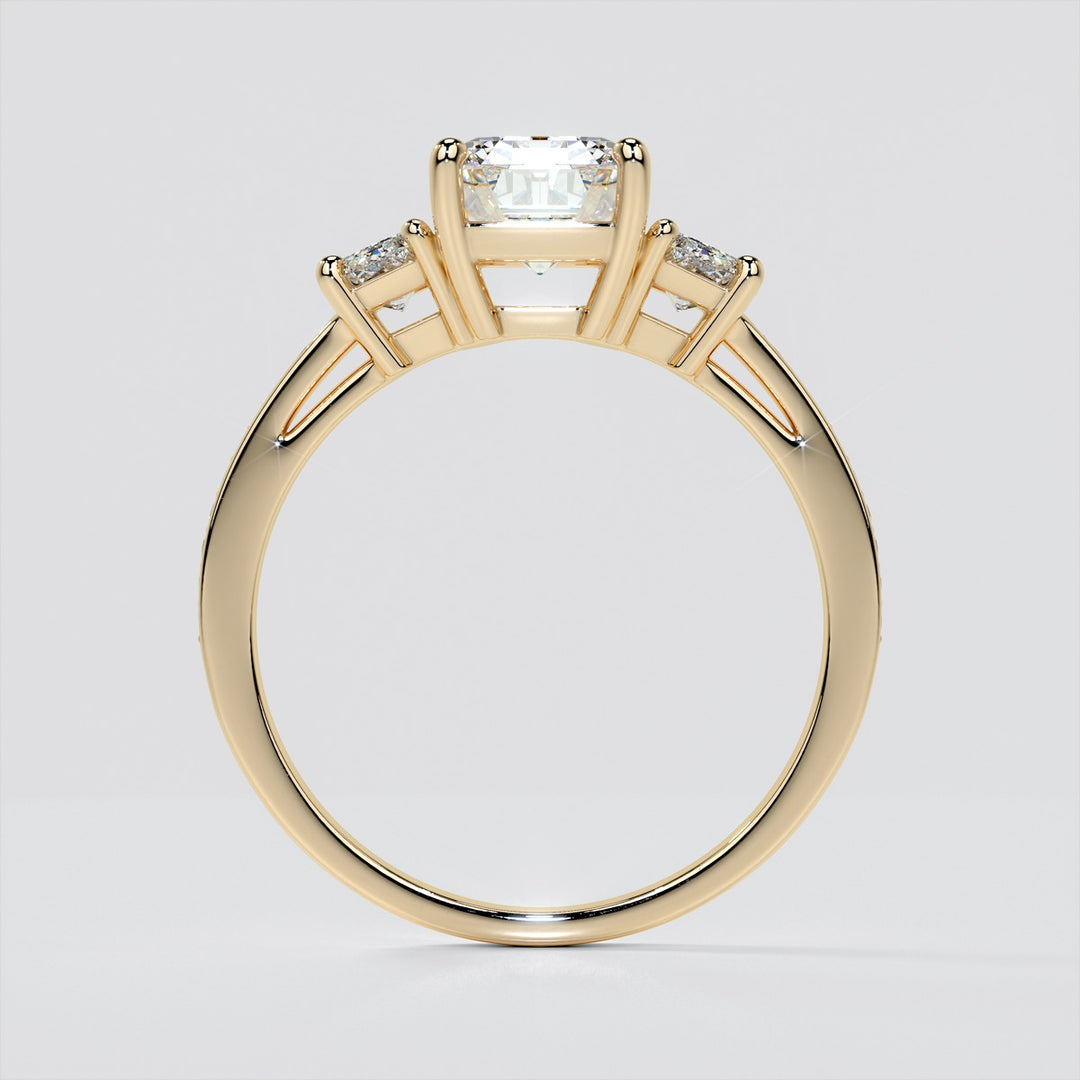 Emerald Cut Three-Stone Engagement Ring With Trapezoid Accents