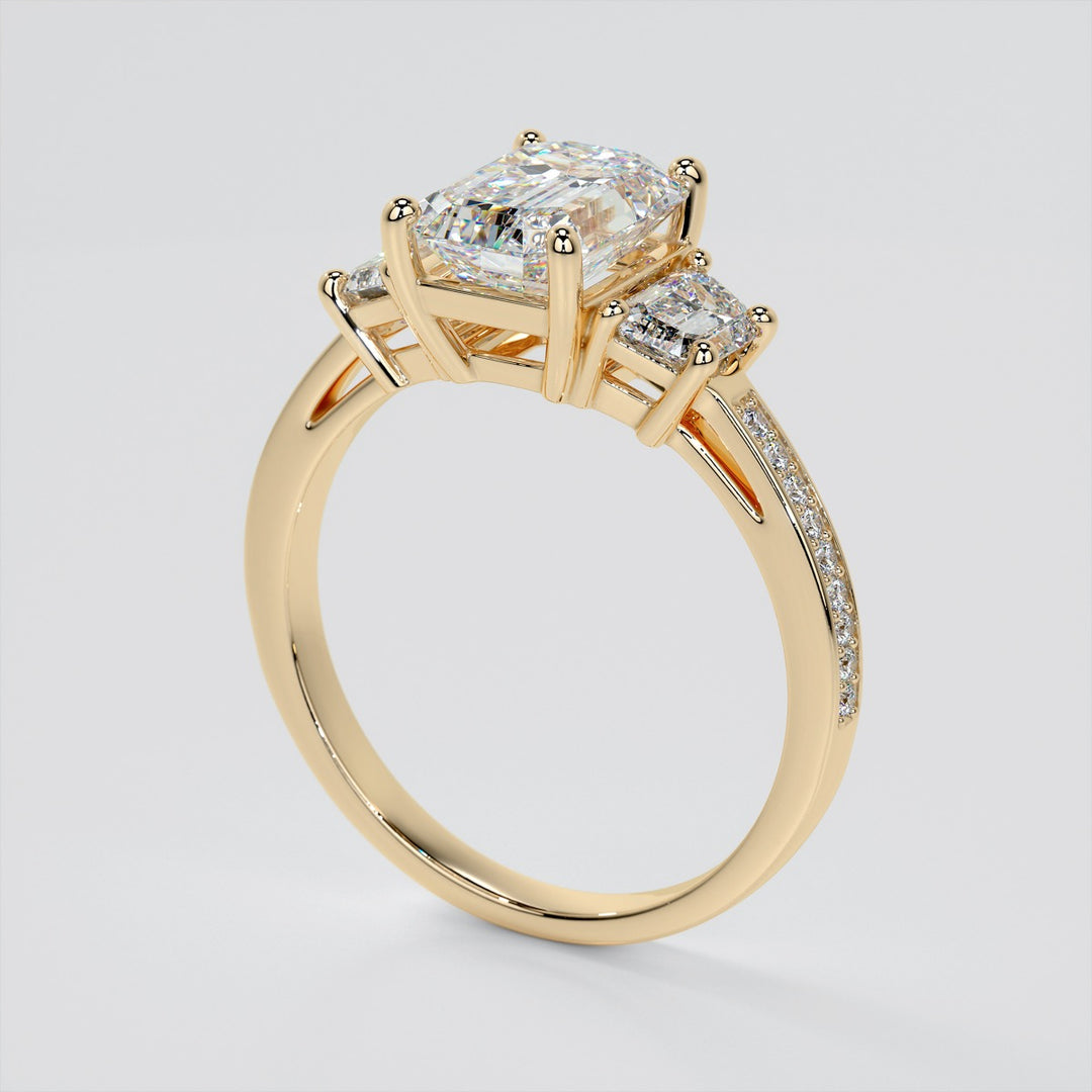 Emerald Cut Three-Stone Engagement Ring With Trapezoid Accents