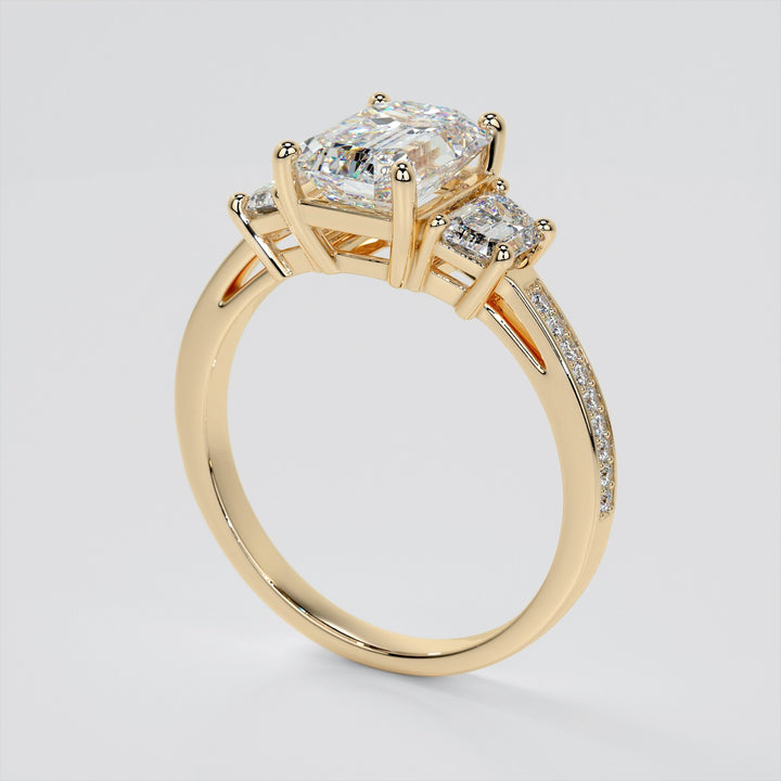 Emerald Cut Three-Stone Engagement Ring With Trapezoid Accents