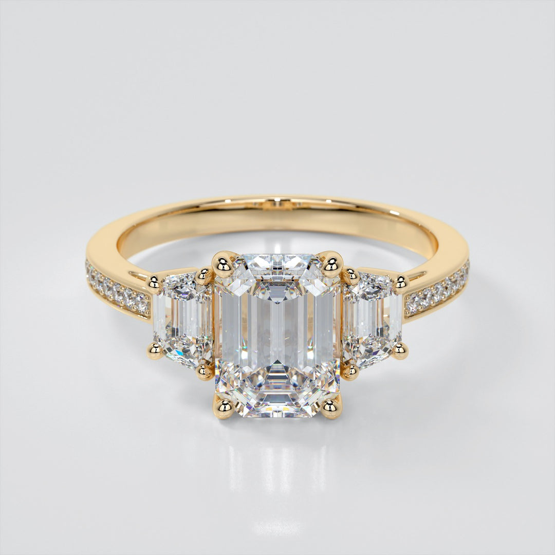 Emerald Cut Three-Stone Engagement Ring With Trapezoid Accents