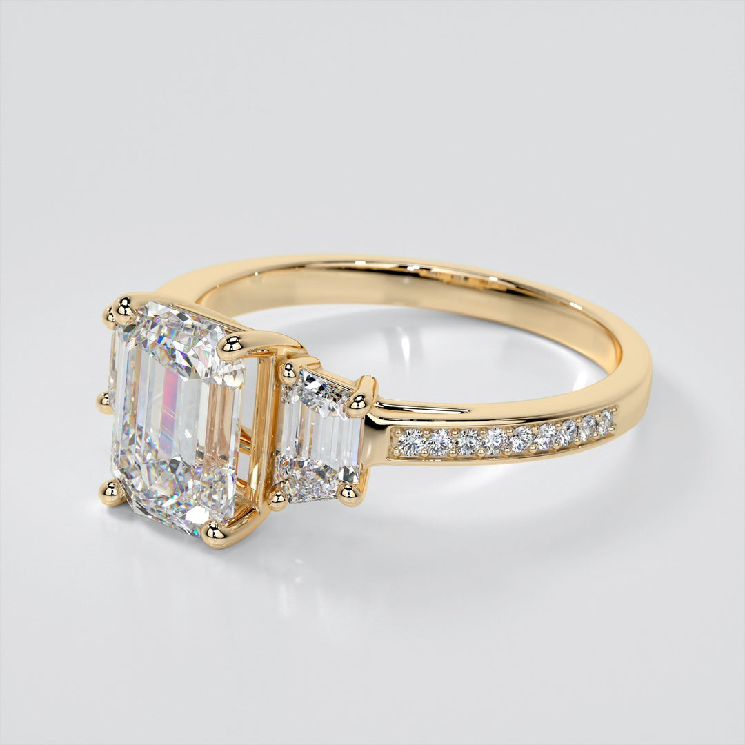 Emerald Cut Three-Stone Engagement Ring With Trapezoid Accents