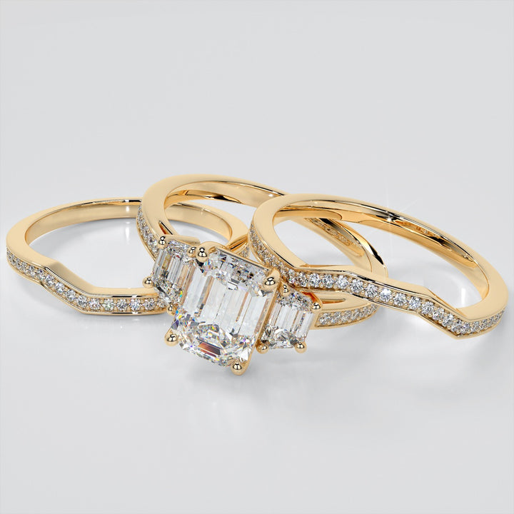 Emerald Cut Three-Stone Engagement Ring With Trapezoid Accents