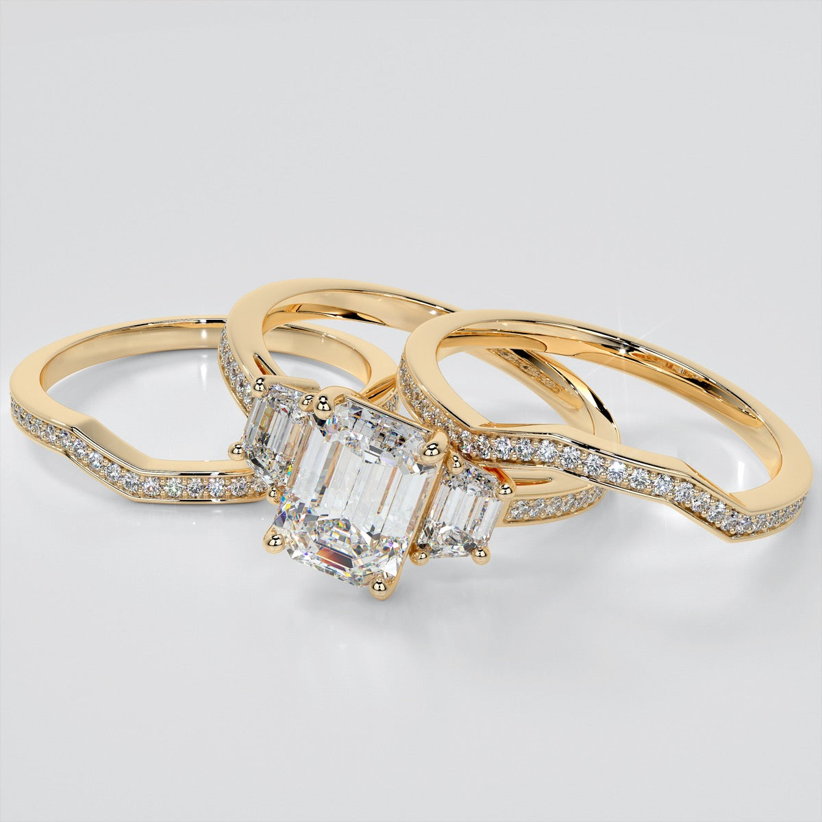 Emerald Cut Three Stone Wedding Set With Trapezoids