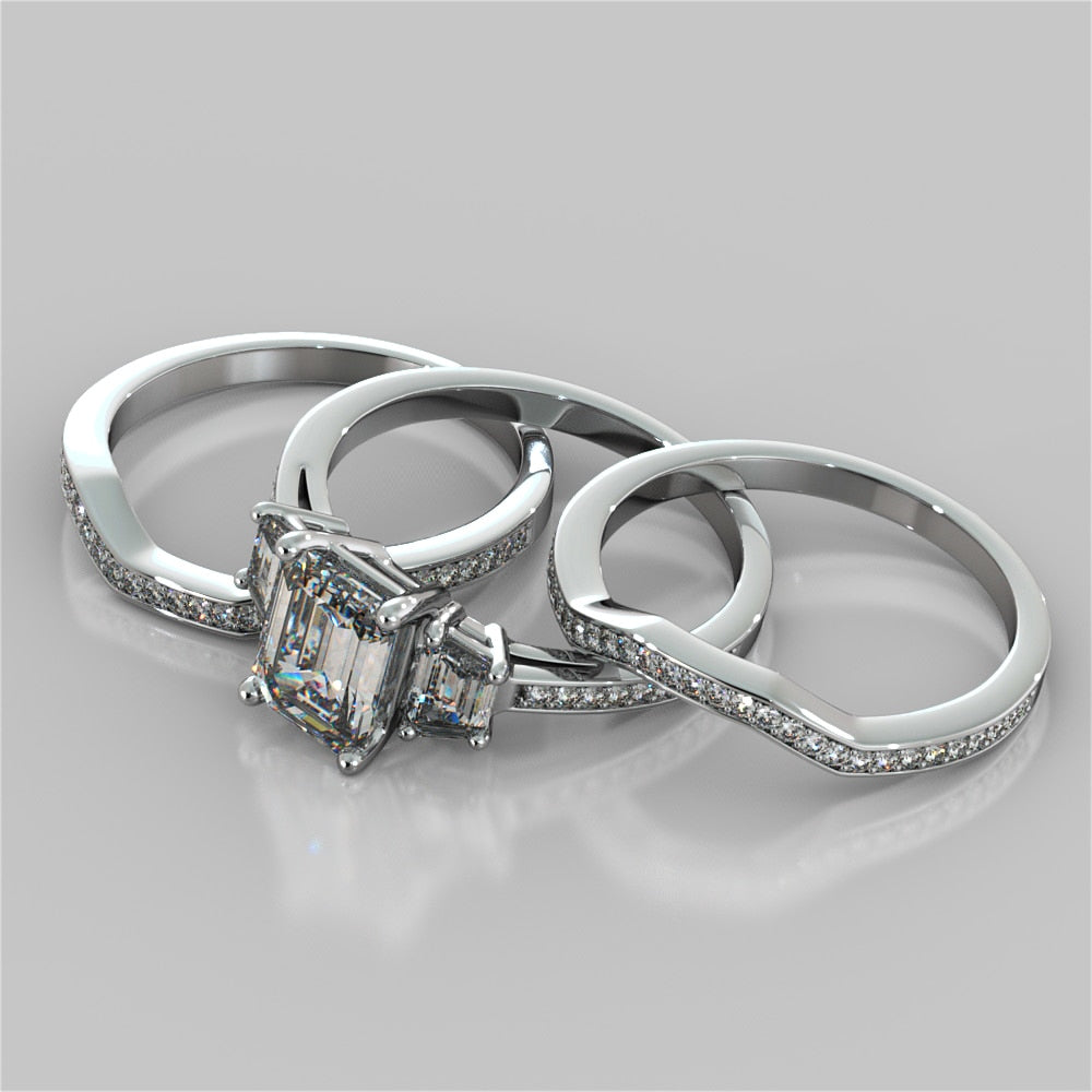 Lab Grown Diamond Radiant Cut Three-Stone Engagement Ring With Trapezoids