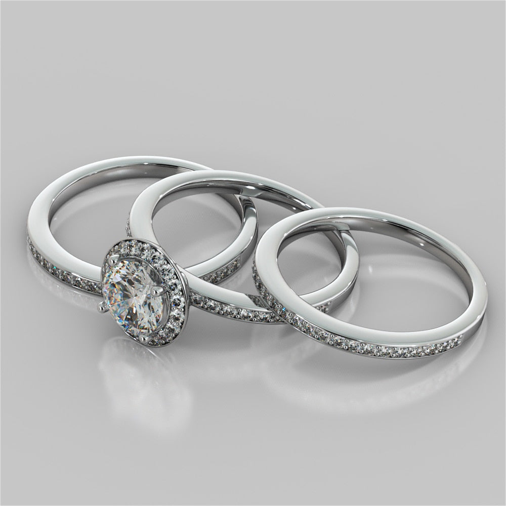 Round Cut Pavé Style Halo Wedding Set With Accents