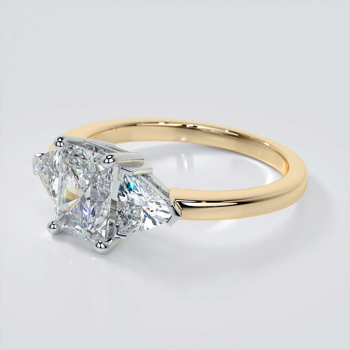 Radiant Cut Three-Stone Wedding Set With Trillion Accents