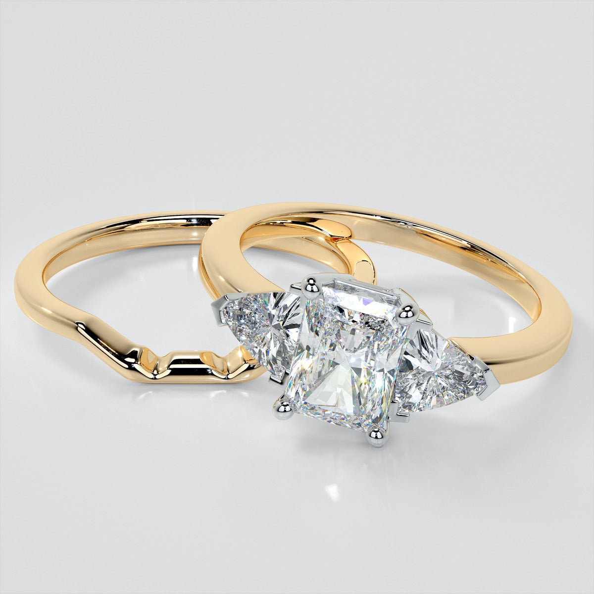 Radiant Cut Three-Stone Engagement Ring With Trillion Accents