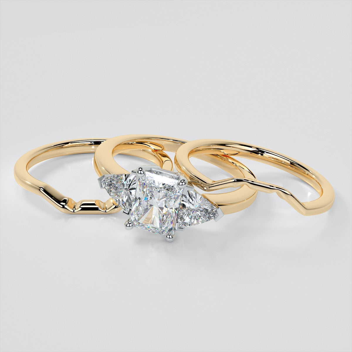 Radiant Cut Three-Stone Wedding Set With Trillion Accents