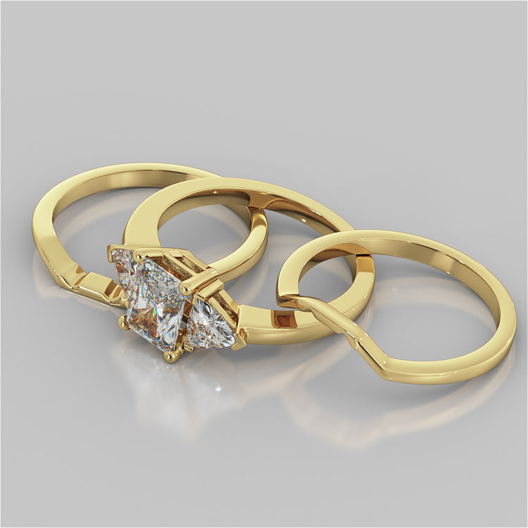 Radiant Cut Three-Stone Engagement Ring With Trillion Accents