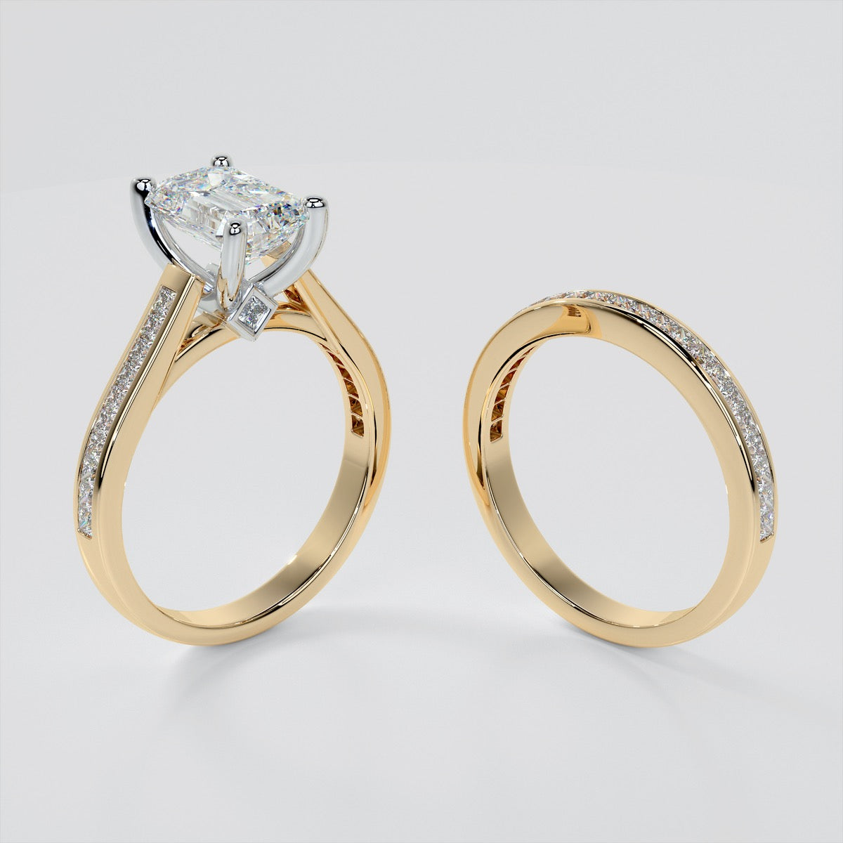 Emerald Cut Cathedral Style Engagement Ring With Princess Cut Accents