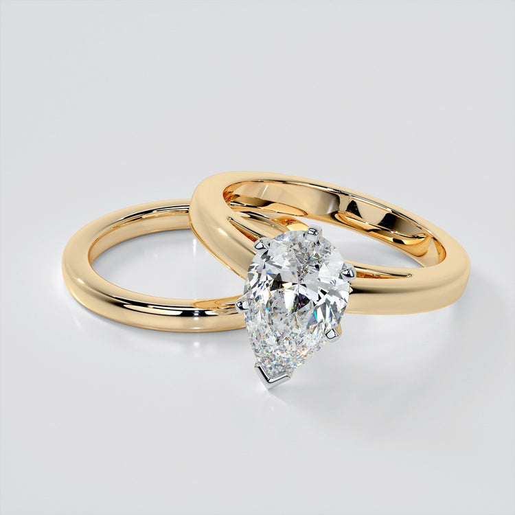 Pear Cut Cathedral Style Engagement Ring