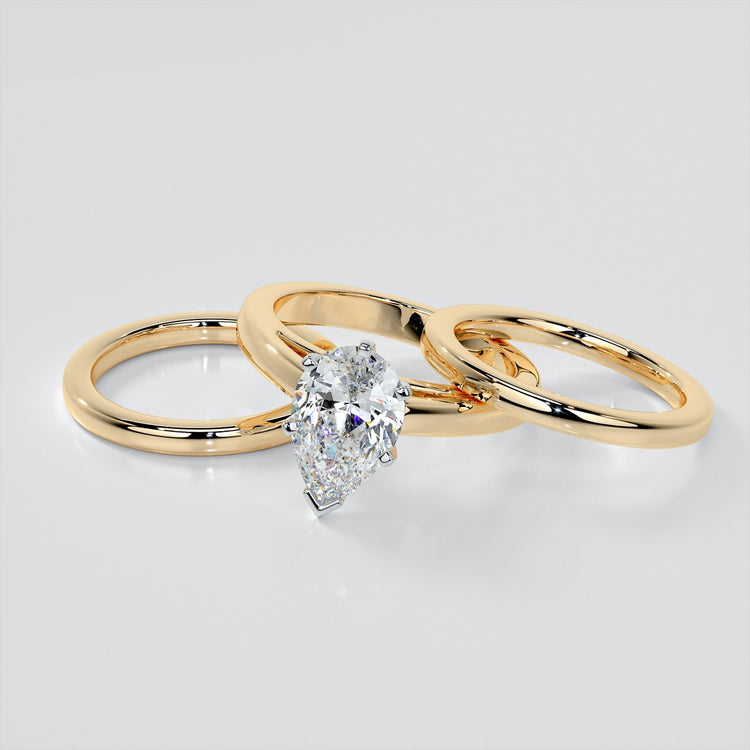 Pear Cut Cathedral Style Engagement Ring