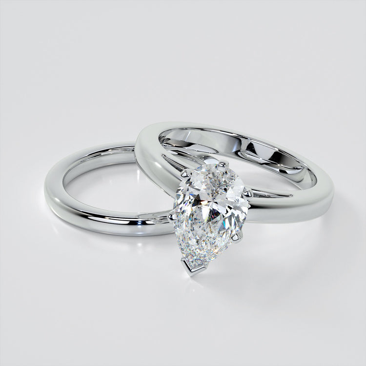 Pear Cut Cathedral Style Engagement Ring