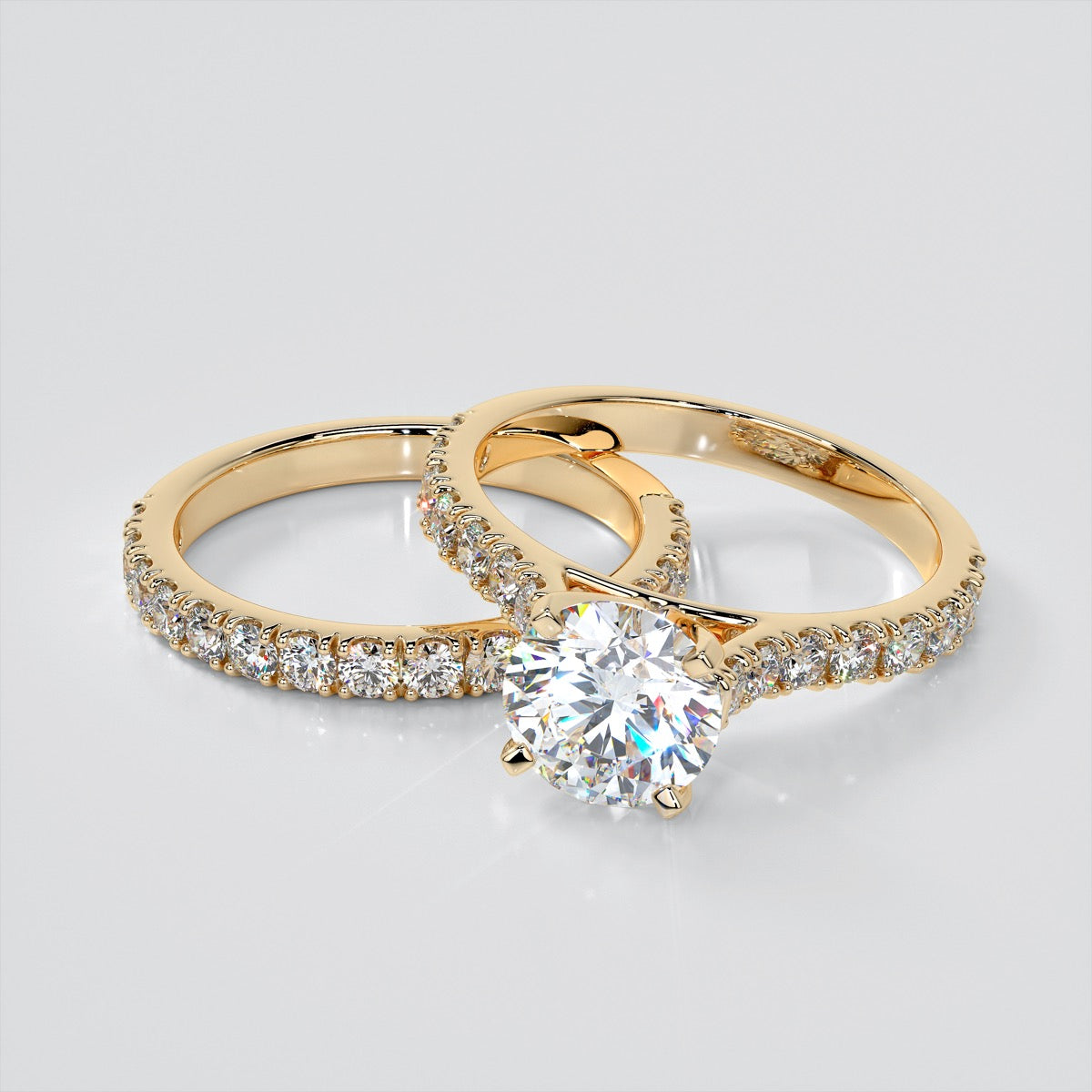 Round Cut Cathedral Scallop Style Engagement Ring With Accents