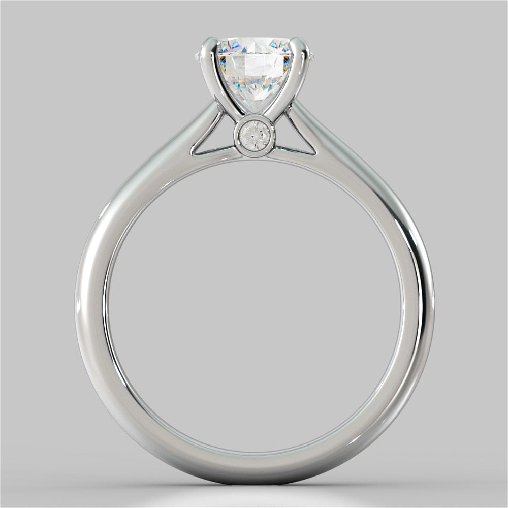 Round Cut Cathedral Engagement Ring With Accents