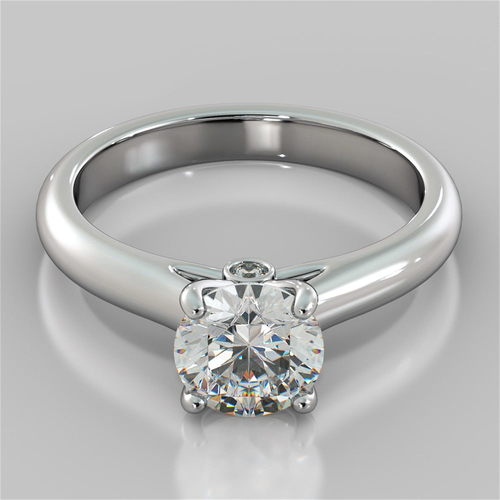 Round Cut Cathedral Engagement Ring With Accents