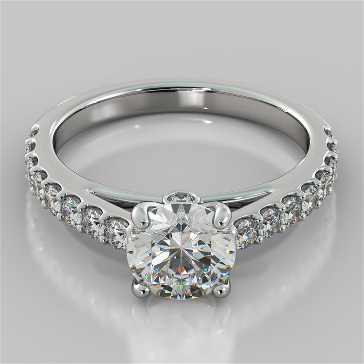 Round Cut Cathedral Style Engagement Ring With Side Accents