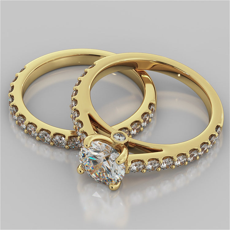 Round Cut Cathedral Style Engagement Ring With Side Accents